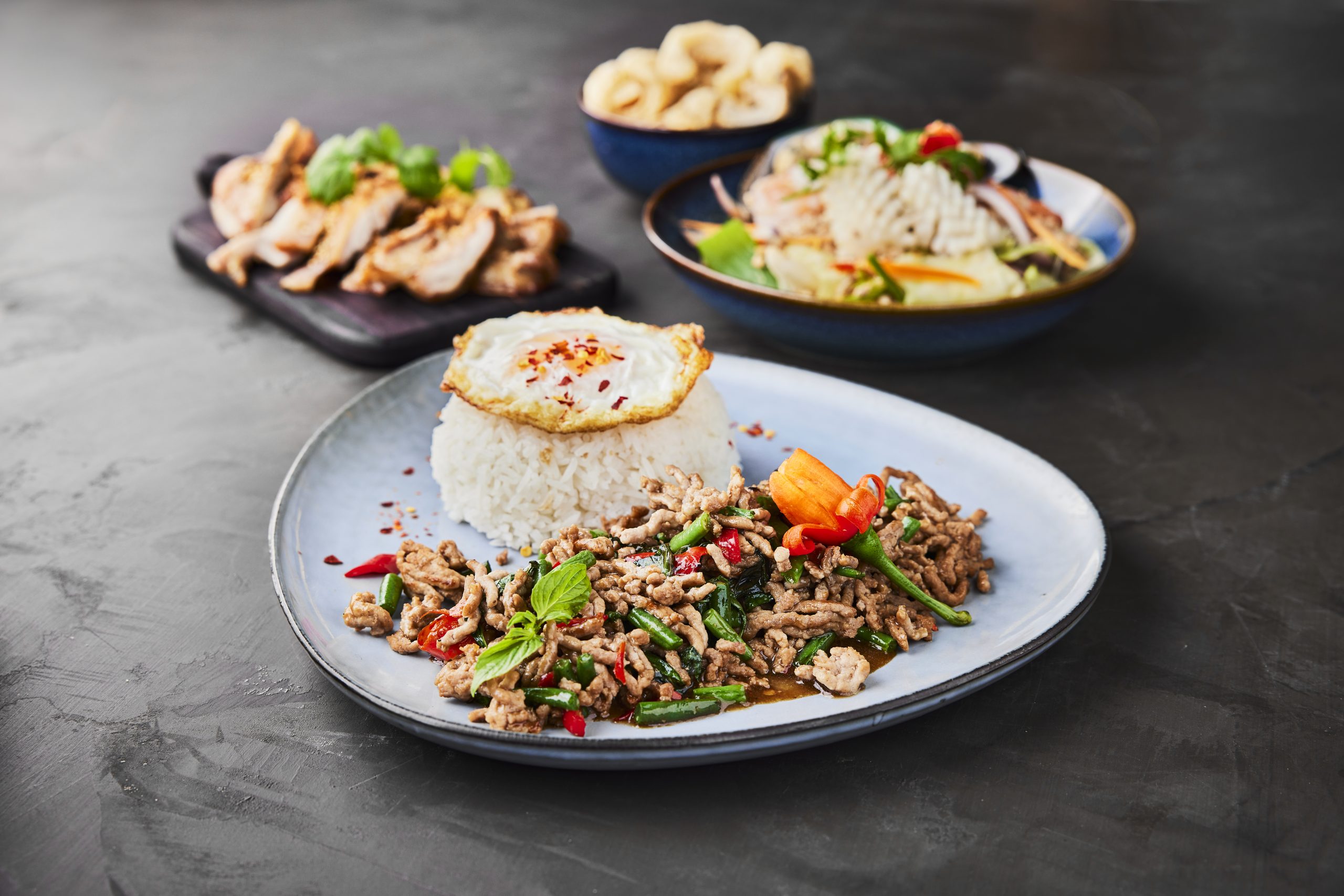 Stir-fried minced pork with Thai basil, rice and a fried egg